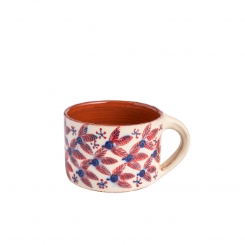 Red faience cup, red leaves pattern
