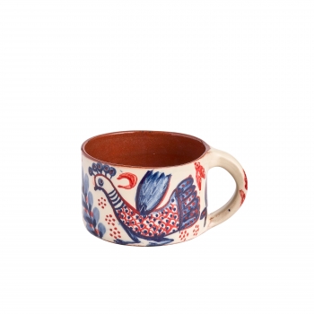 Red faience cup, peacock pattern